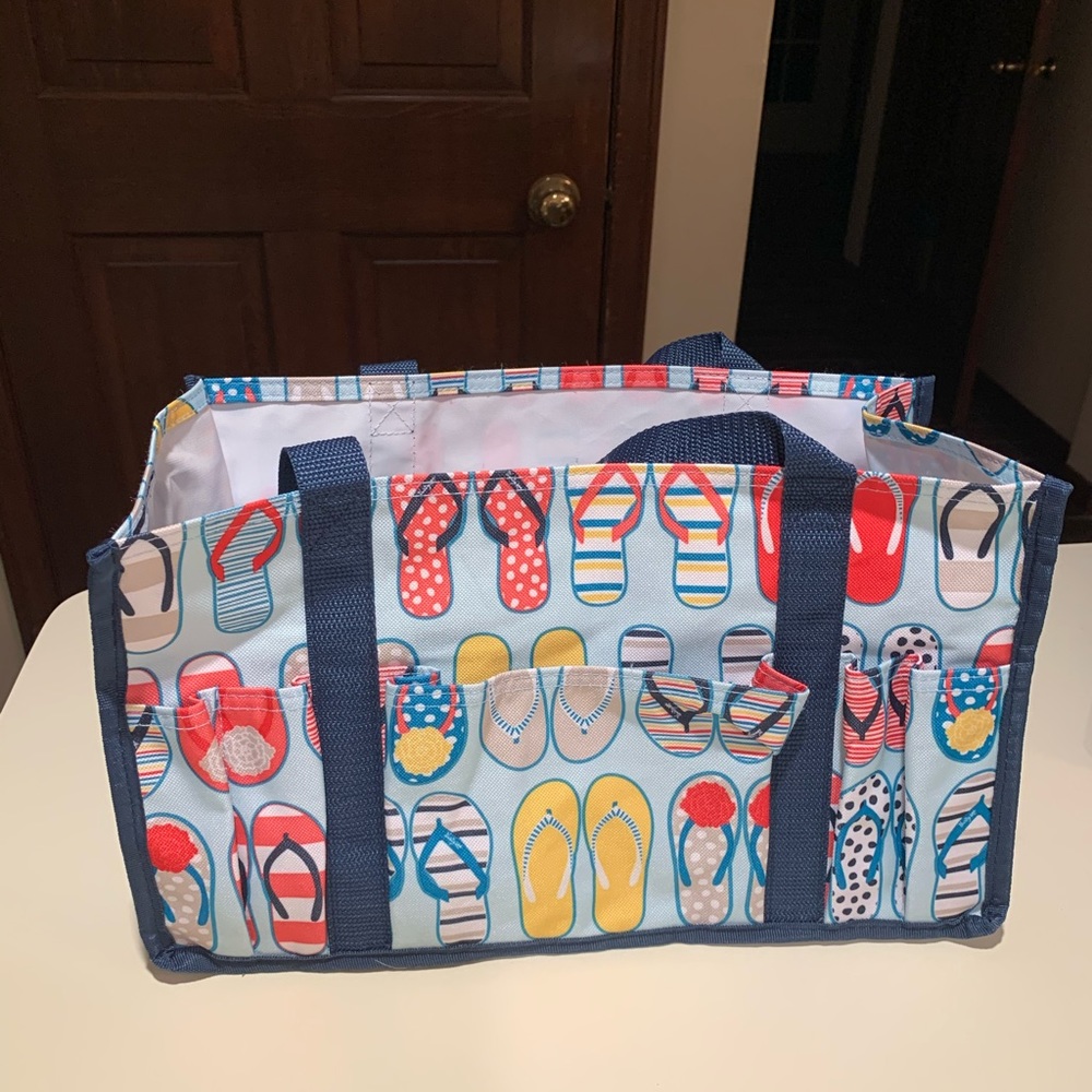 Thirty-one tiny utility tote with flip flops